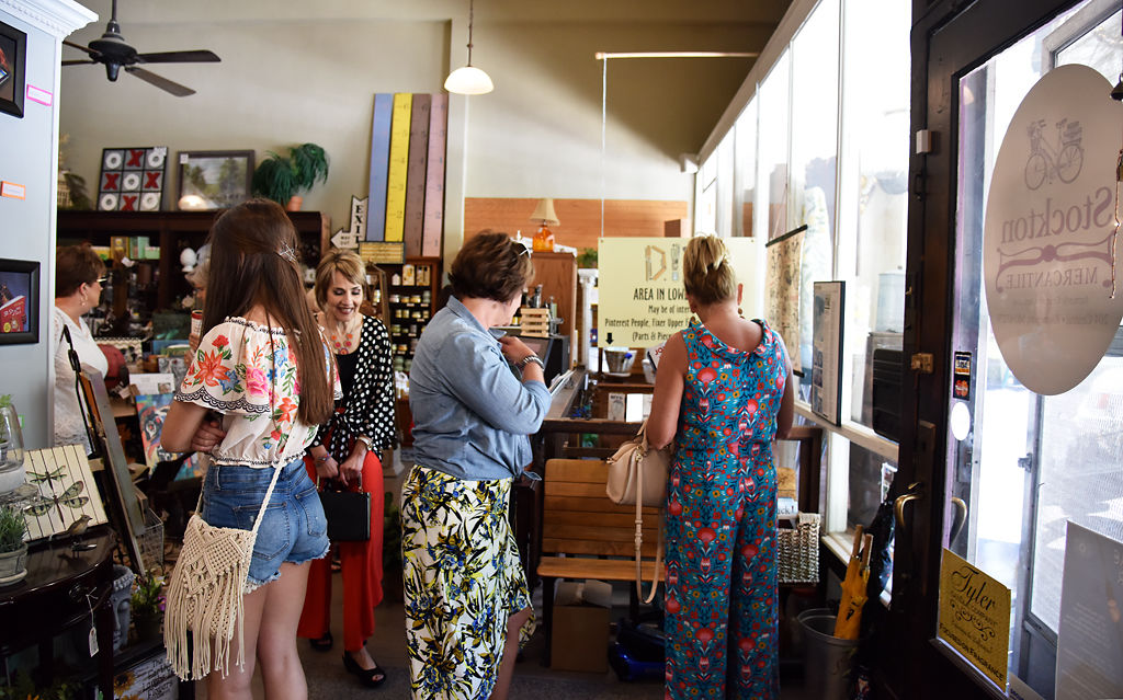 Customers walk around Stockton Mercantile